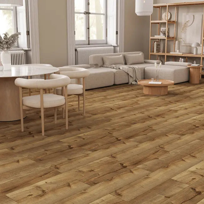 Modern living room with wooden flooring, furniture, and decor.
