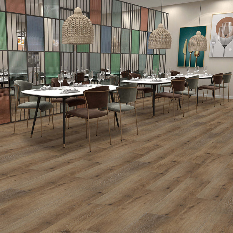 Dining area with tables and chairs on a wooden floor
