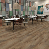 Dining area with tables and chairs on a wooden floor