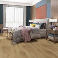 Modern bedroom with a bed, nightstands, and decor elements.
